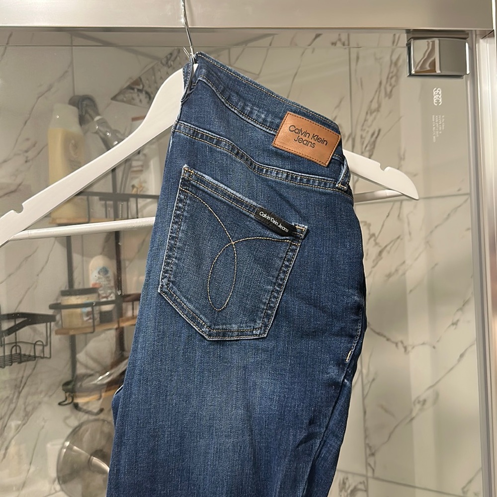Play The Used Calvin Klein jeans, size 29 ankle cut small rips